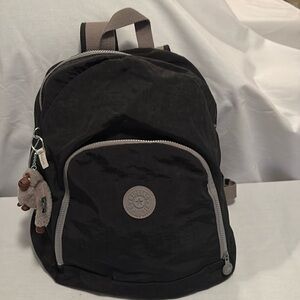 Kipling black like new backpack 2 zipper closure includes gorilla thumb keychain